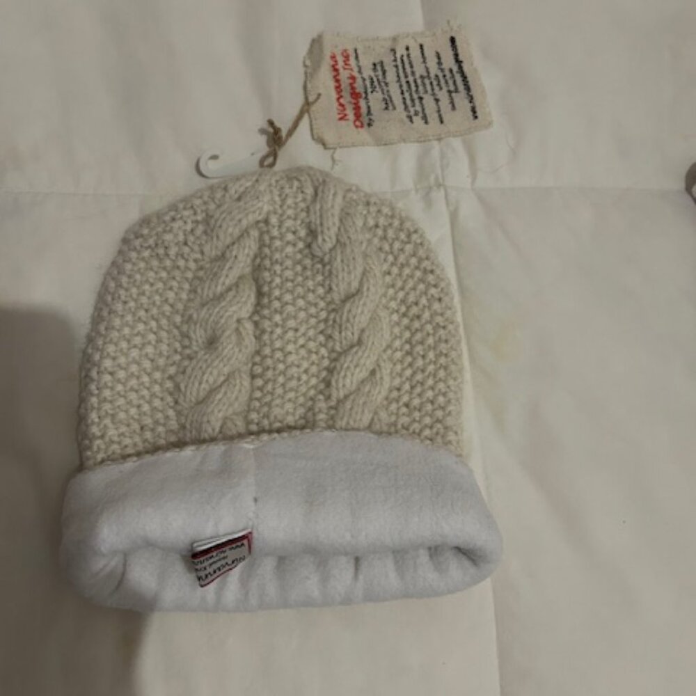 BRAND NEW WITH TAG ATTACHED OFF WHITE WINTER HAT NIRVANA DESIGNS INC